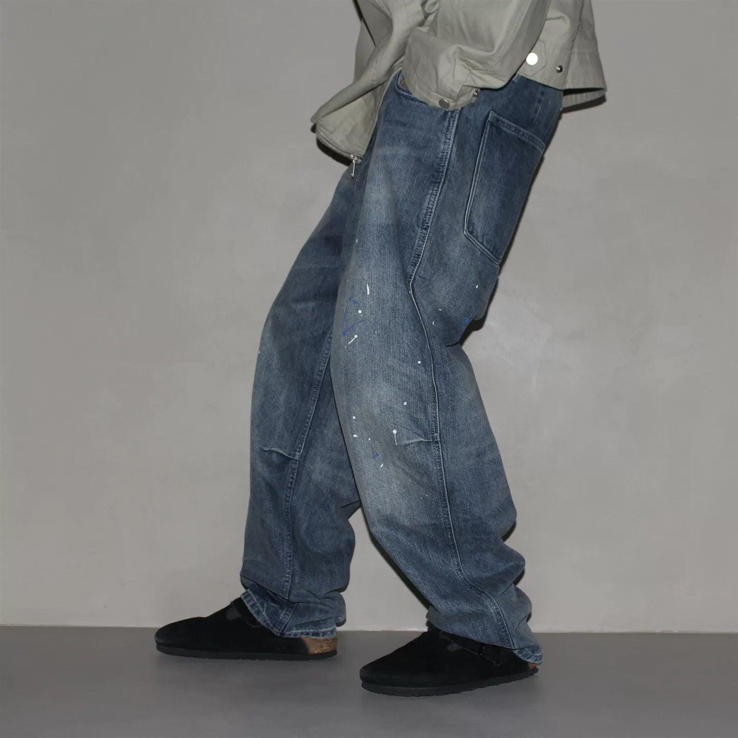 GcBrand Lab retro themed elements knee fold design Japanese washed distressed splashed ink jeans