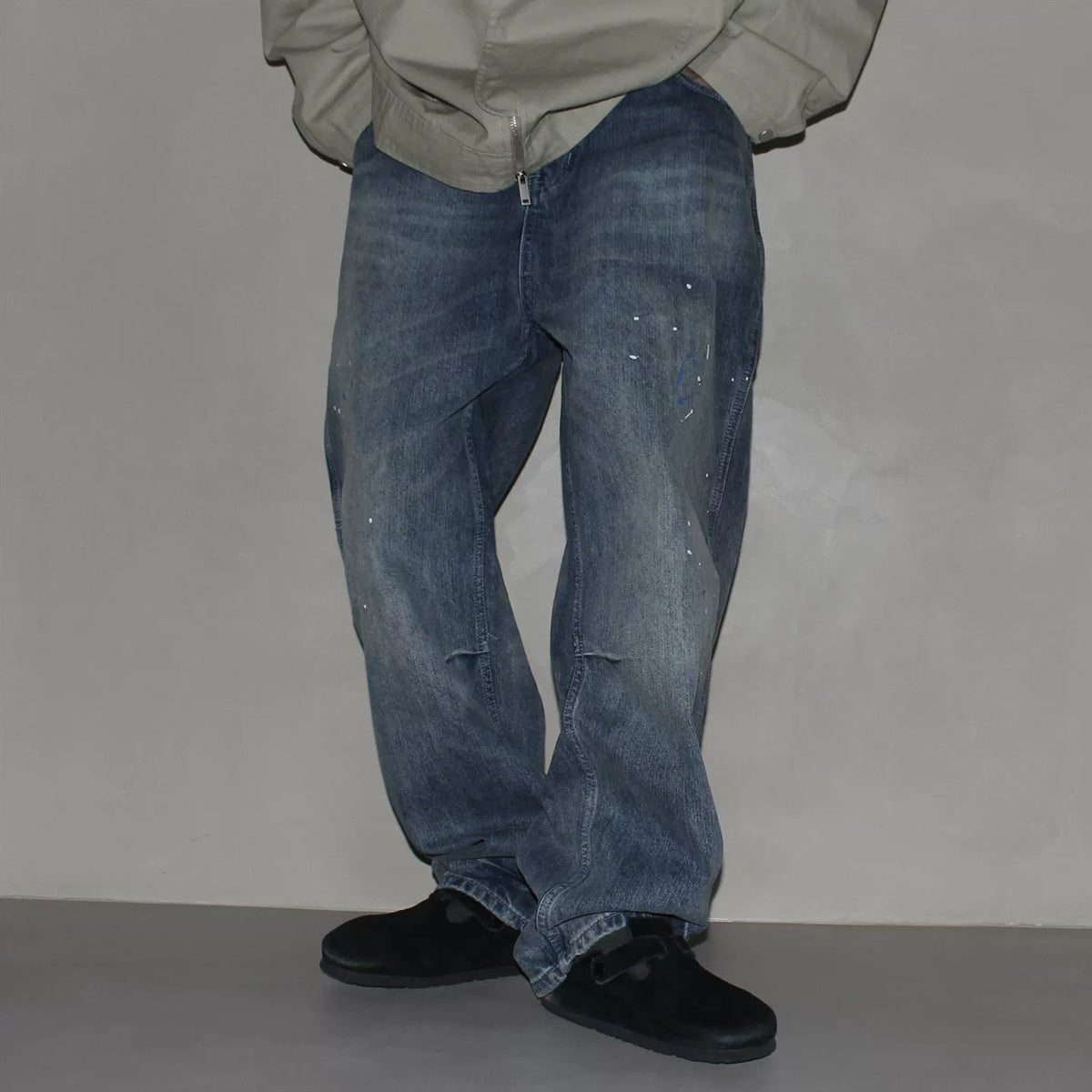 GcBrand Lab retro themed elements knee fold design Japanese washed distressed splashed ink jeans